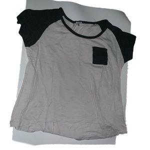 CHARLOTTE RUSSE: A top with a left chest pocket.